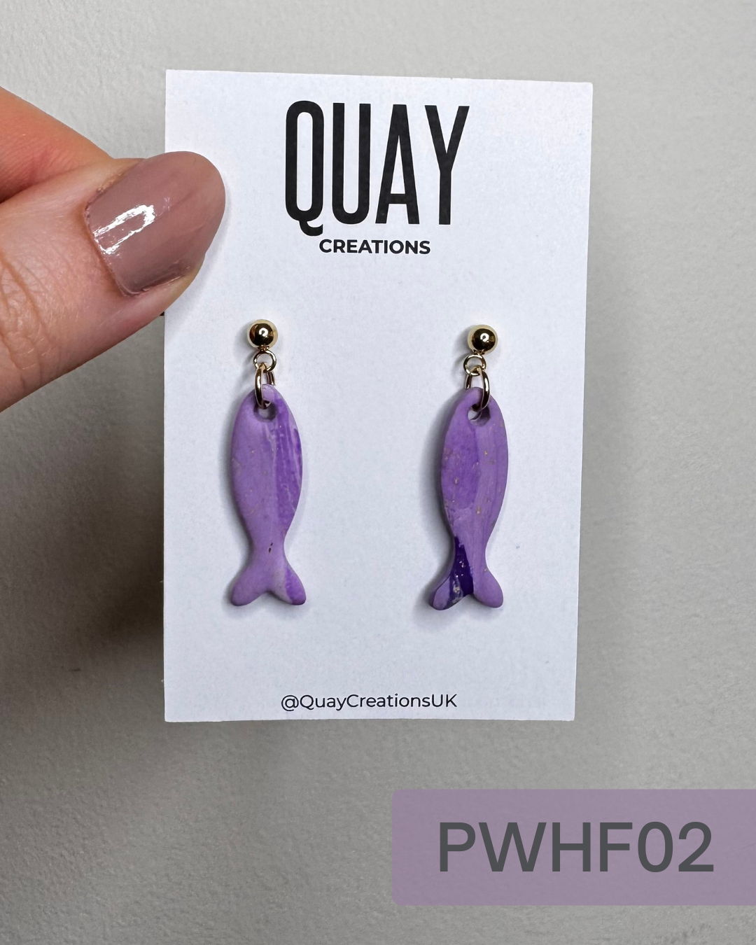 Purple Dangle Fish Studs